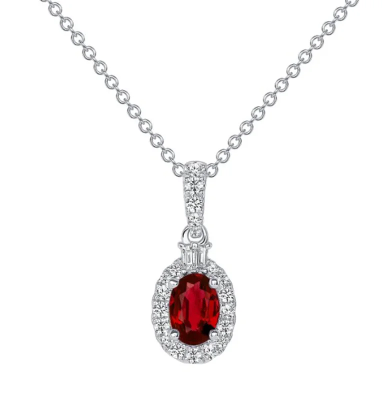 0.51CT OV RUBY/ 18KWG BR/ TRAP 0.18CTW DIA OV PENDANT