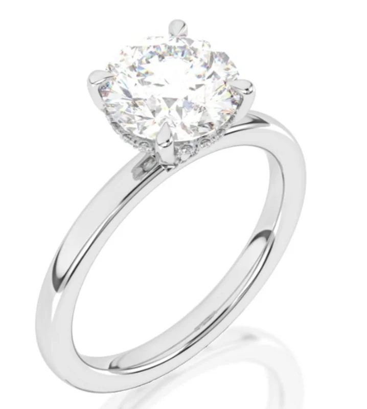 14KWG 0.06CTW BR DIA UNDER HALO W SOLITAIRE SHANK ENG RING