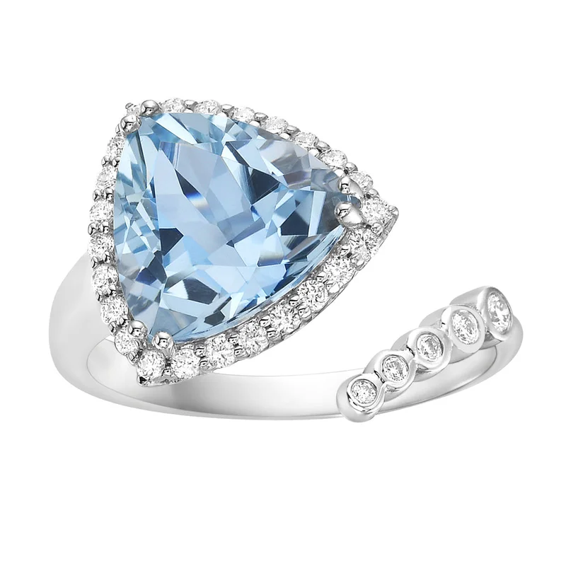 14KWG 4.18CT SKY BLUE TOPAZ AND 0.26CTW BR DIA OPEN BYPASS RING