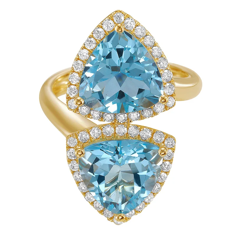 14KYG 8.17CTW SKY BLUE TOPAZ AND 0.54CTW BR DIA HALO BYPASS RING