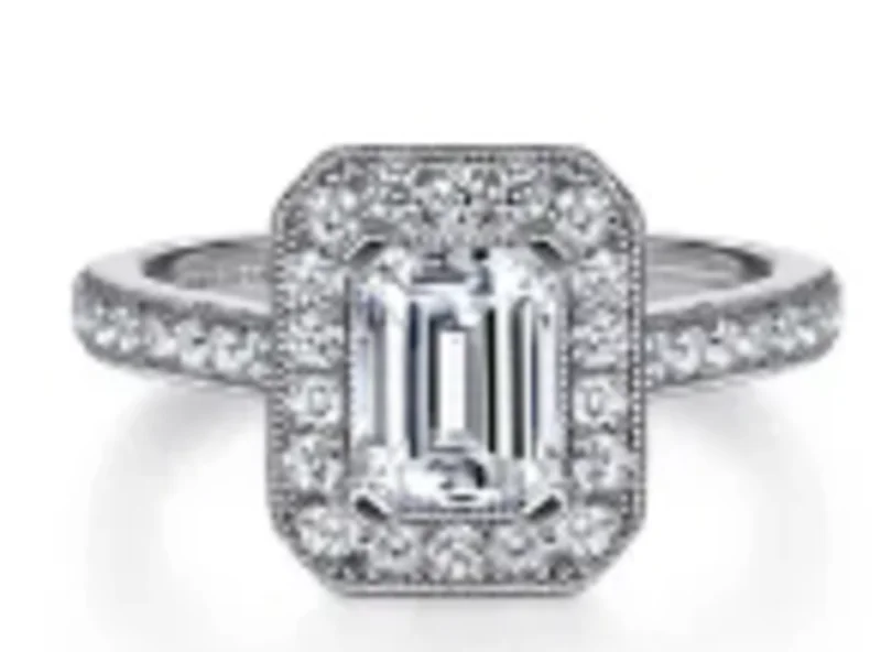 14WG BR 0.49CTW DIA MILGRAIN EM HALO ENG RING. S#1074613HEAD SIZE 7 X 5 EMERALD CUT