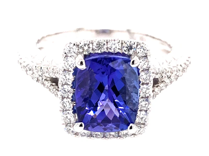 18KWG 0.51CTW BR DIA 2.79CTW TANZANITE CUS HALO SPLIT SHANK RING
