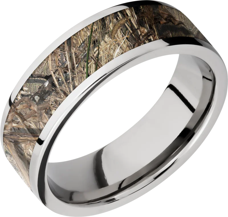 Cobalt chrome 7mm flat band with one inlay that is 5mm wide of a mosaic pattern. BLACK DINO
