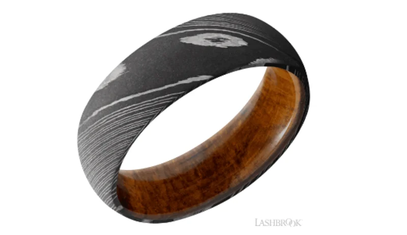 Damascus steel 7mm domed band with a hardwood inside sleeve. Acid/ DESERTIRONWOOD