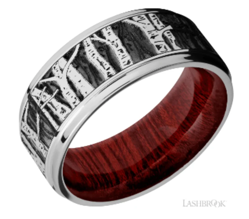 Hardwood sleeve, inside of a cobalt chrome band with grooved edges & laser carved pattern of Aspen